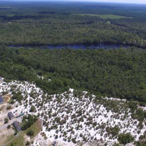 Aerial view of property and surrounding area featu