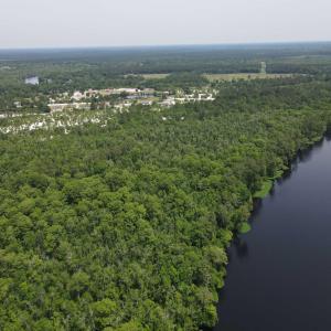 Drone / aerial view of a large body of water and a