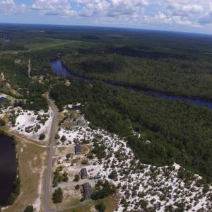 Aerial view of property and surrounding area featu