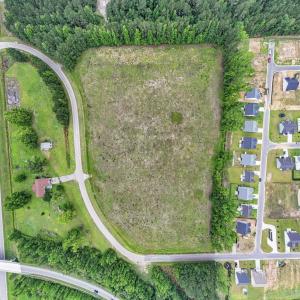 Aerial view of sparsely populated area with proper