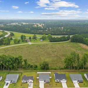 View of property location with a forest