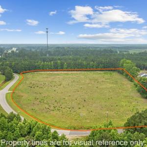 Aerial view of sparsely populated area featuring p