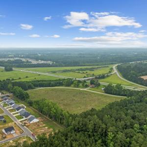 Aerial view of sparsely populated area with proper