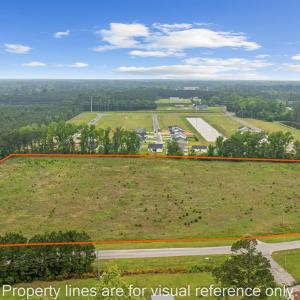 Aerial view of sparsely populated area featuring a