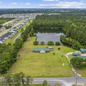 Aerial overview of property's location with a larg