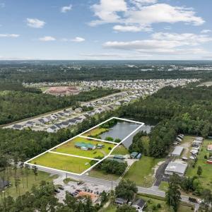 View of property location featuring a heavily wood