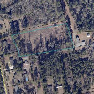 Aerial view of property's location with property p