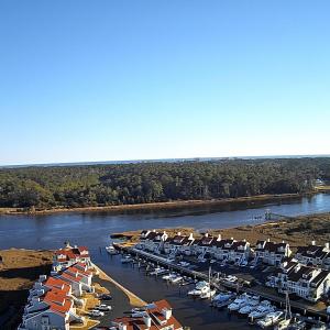 Water view featuring a heavily wooded area