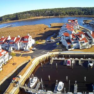Aerial view of a large body of water and a marina