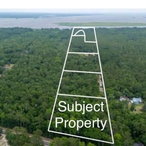 Aerial view of property's location featuring a for
