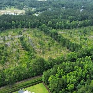 Aerial view of property and surrounding area featu