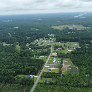 Aerial overview of property's location with a heav