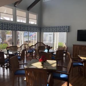 Dining space with a towering ceiling, plenty of na