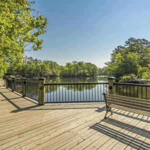 Wooden deck featuring a water view