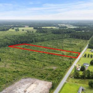 Aerial view of sparsely populated area with proper