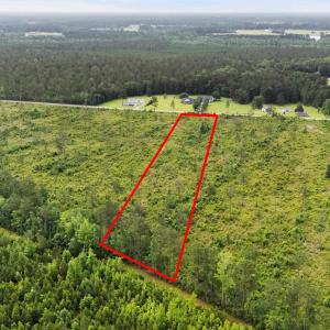 Aerial view of sparsely populated area with proper