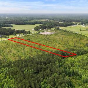 View of rural area featuring a heavily wooded area