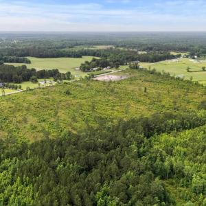 View of rural area featuring a heavily wooded area
