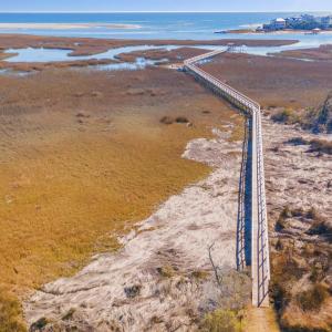 View of property location with a nearby body of wa