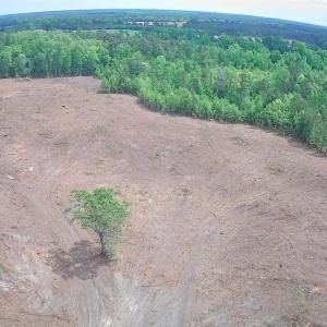 Aerial view of property and surrounding area featu