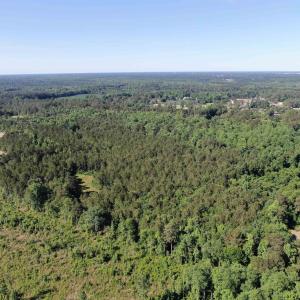 Aerial view of property and surrounding area featu