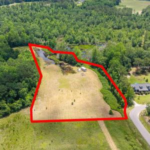 Aerial view of property and surrounding area featu