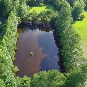 View from above of property featuring a nearby bod