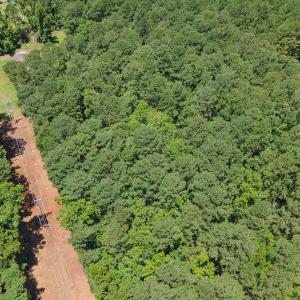 Aerial overview of property's location with a heav