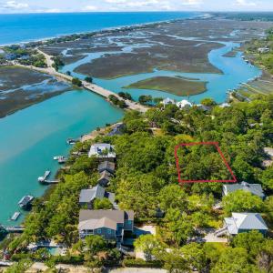 View of property location with a nearby body of wa