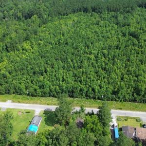 Aerial view of property and surrounding area featu