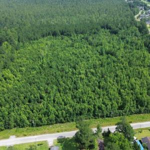 Aerial overview of property's location with a heav