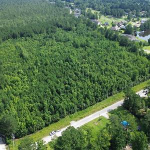 Aerial view of property's location featuring a for