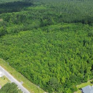 Aerial view of property and surrounding area featu