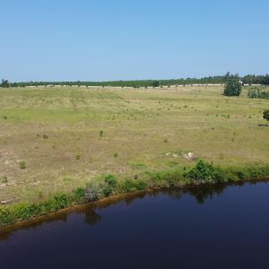 View of rural area featuring a nearby body of wate