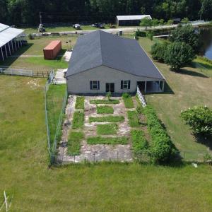 Aerial view of property and surrounding area featu