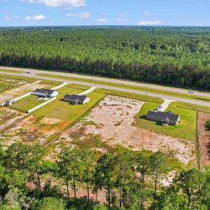 View of rural area featuring a heavily wooded area