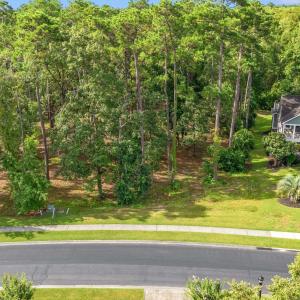 Aerial view of property and surrounding area with