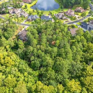 Aerial view of property and surrounding area with