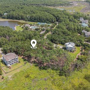Aerial view of property and surrounding area featu