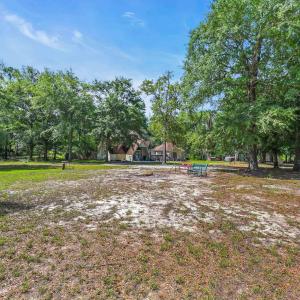 View of yard featuring view of scattered trees