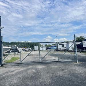 View of green lawn featuring a water view