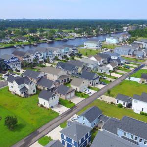Community sign featuring a yard