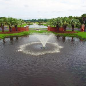 Aerial view of property's location with a large bo