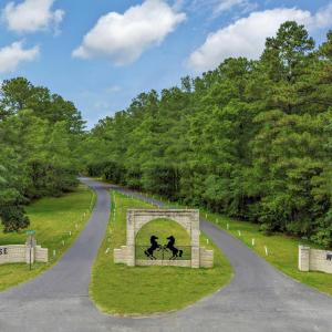 View of property's community featuring a yard and