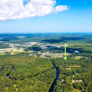 Aerial view of property's location featuring a hea