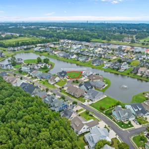 Aerial view of property's location with a nearby b