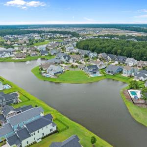 Aerial view of residential area with a nearby body