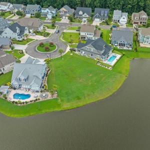 Aerial perspective of suburban area featuring a po