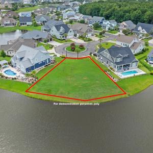 Aerial perspective of suburban area with a pool an
