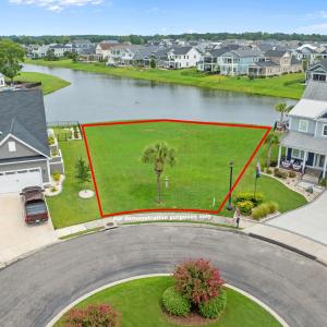 Aerial perspective of suburban area with a nearby